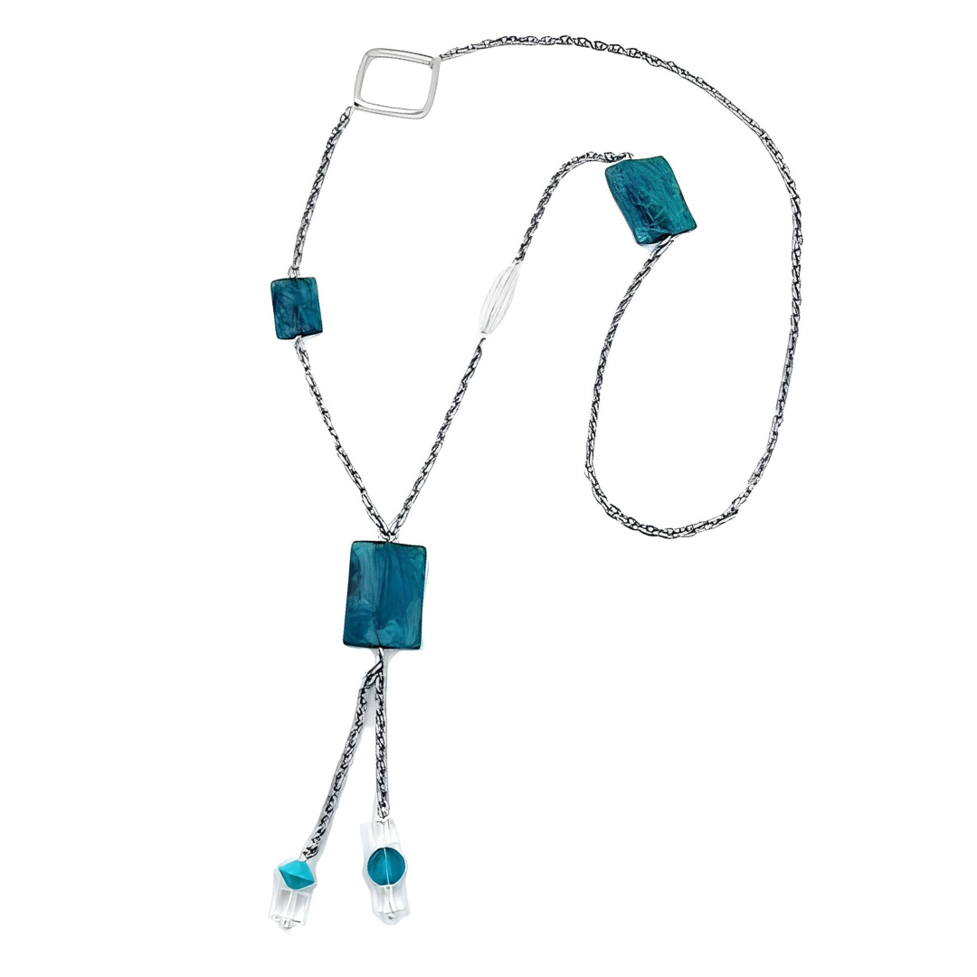 Y-Kette mit türkis marmorierter Pillow-Perle und grauer Ankerkette auf weißem Hintergrund