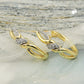 Scharniercreole überkreuzt Micro-Pavé Zirkonia 18x4mm 9 Karat Gelbgold
