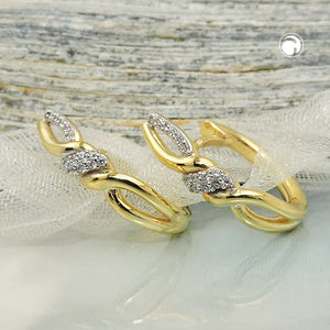 Scharniercreole überkreuzt Micro-Pavé Zirkonia 18x4mm 9 Karat Gelbgold