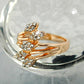 Ring 17mm Blütenranke rotvergoldet mit 5 Blättern mit Glassteinen Ringgröße 50 - 54 - 56